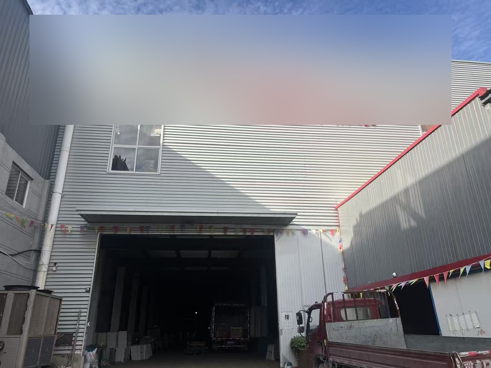 Exterior of a Chinese manufacturing facility photographed during a supplier verification visit
