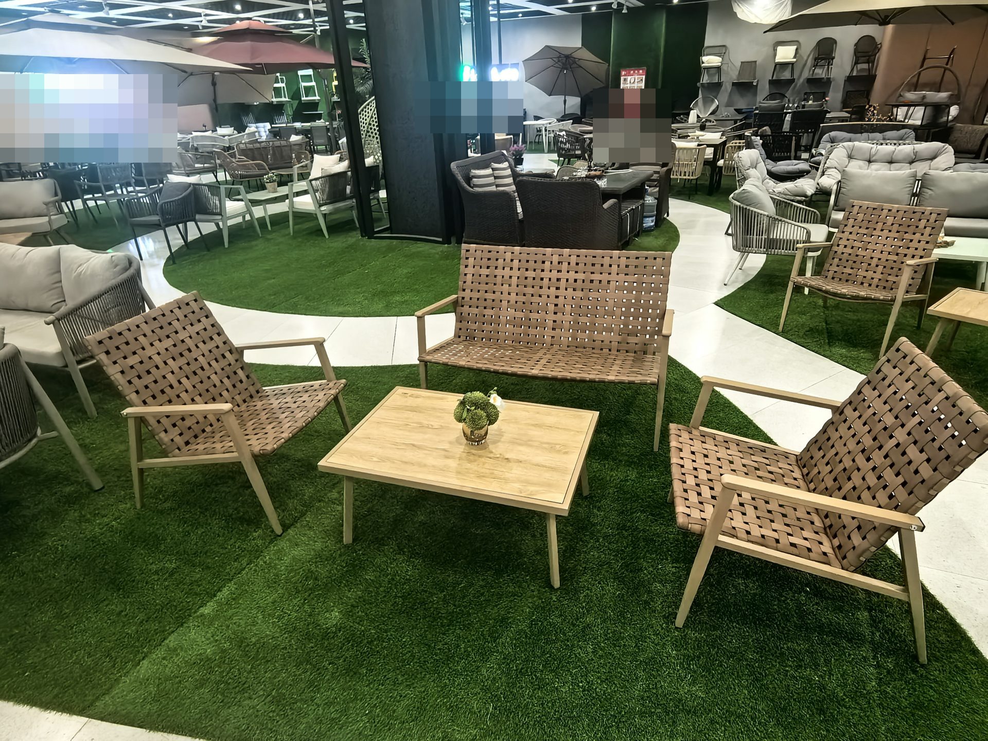 Finished rattan furniture sets styled in the factory showroom