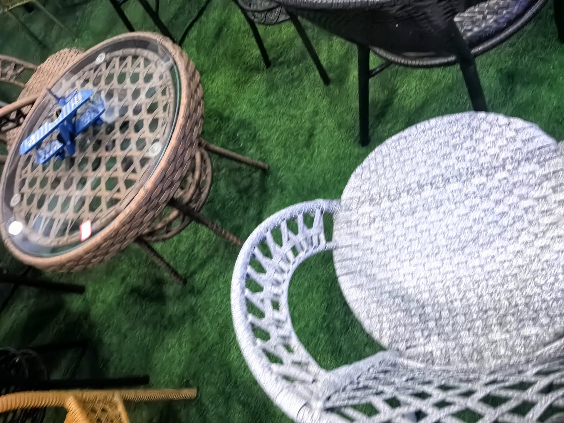Close-up of rattan weave tension checked during quality control